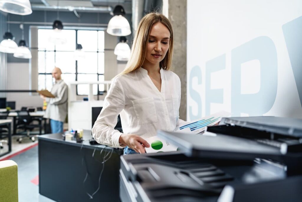 Woman is checking copier lease cost